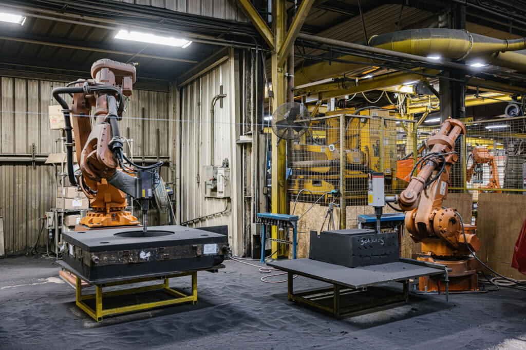 Two robots at the foundry.