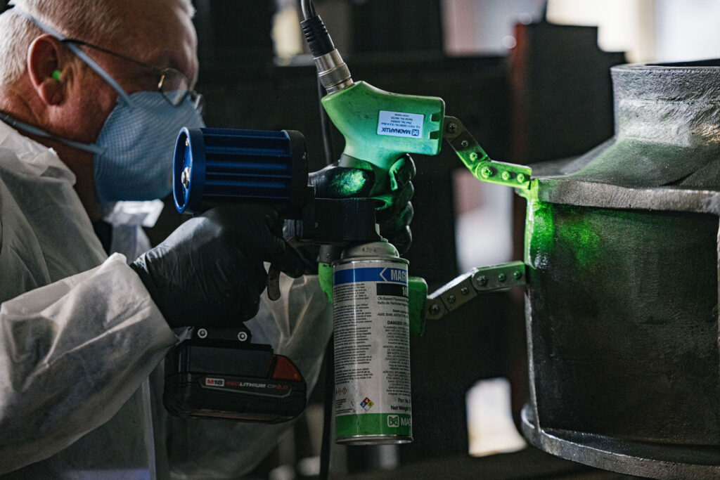 A man performing a quality control test.